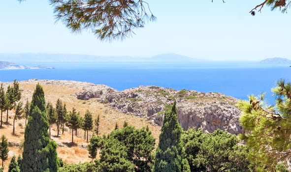 Beautiful summer landscape with sea and mountain views with vegetation. The Island Of Crete, Greece.