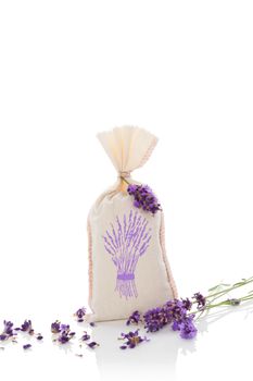 Lavender aromatherapy. Lavender herbs and bag with dry lavender isolated on white background. Alternative medicine.