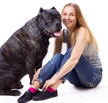 girl sitting and smile  next to his dog Cane Corso. isolate. square crop