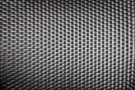 plastic woven wicker pattern, black color background texture