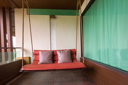 swing sofa furnish, and leather pillow for decoration and relax at balcony
