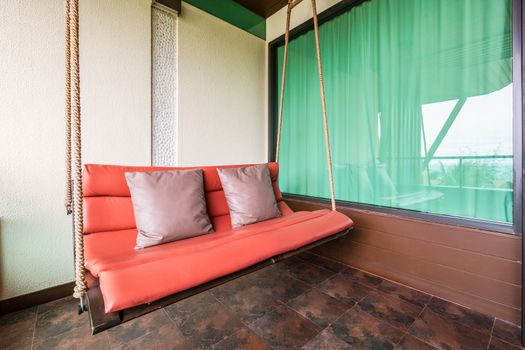 swing sofa furnish, and leather pillow for decoration and relax at balcony