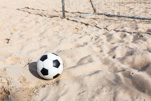 football soccer on sand beach