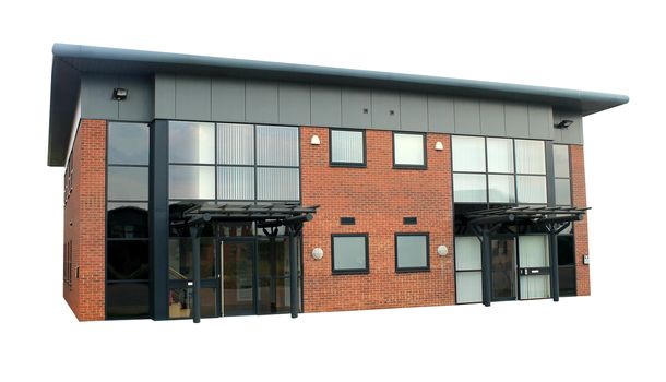 Empty office building on a business park isolated on a white background.