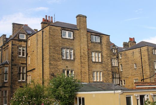 Rear view of flats and apartments converted from old buildings.