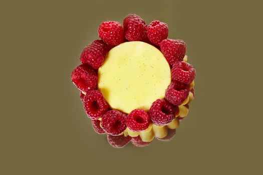 Home made tartlets with raspberries. With copy space