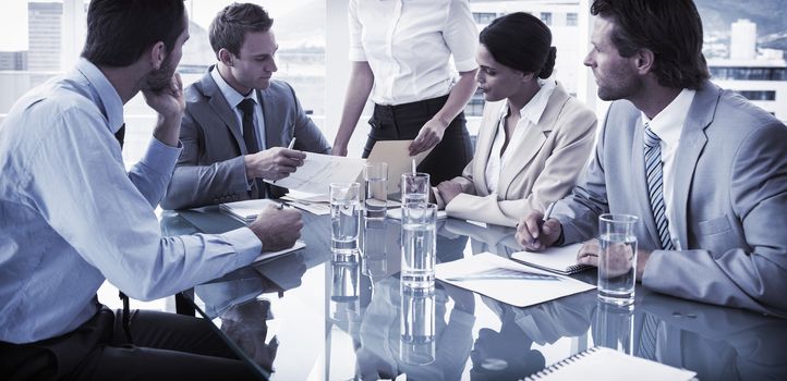 Young business people in board room meeting at the office