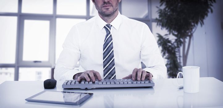 Businessman working at his desk on white background