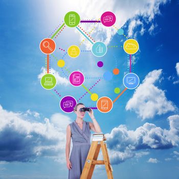 Businessman looking on a ladder against blue sky