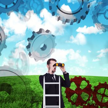 Businessman looking on a ladder against blue sky over green field