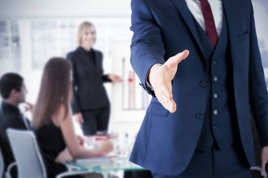 Businessman ready to shake hand against businesswoman reporting to sales in a seminar