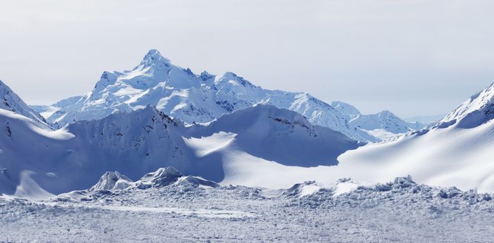 Russia. Caucasus. View on Elbrus Mount - the highest point of Europe from Cheget Mount. Panorama the review from 4 shots