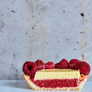 Home made tartlets with raspberries. With copy space