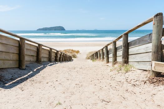 Sand path leading to Pauanui Beach New Zealand
