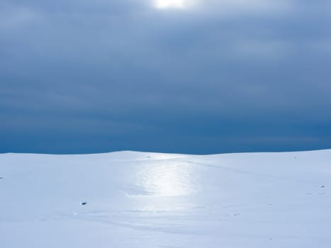 A minimalistic winter scenery on a mountain top.