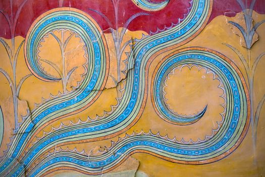 The restored fragment of ancient wall paintings. on the ruins of the Palace of Knossos . The Minoan era, the island of Crete, Greece.