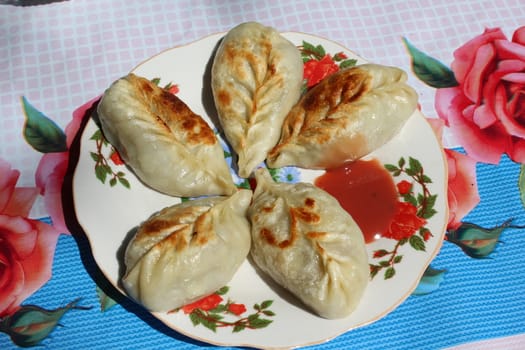 Asian national food (Fried manty). As it is cooked in Kyrgyzstan.