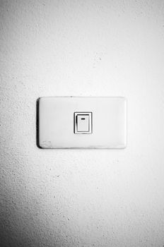 electric white switch on wall black and white color tone style