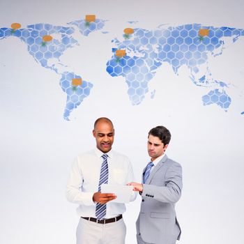 Businessmen working together against world map 