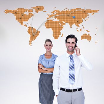 Businessman having phone call while his colleague posing against world map with lines