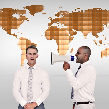 Businessman yelling with a megaphone at his colleague against orange world map on white background
