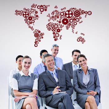 business team during a meeting against grey background