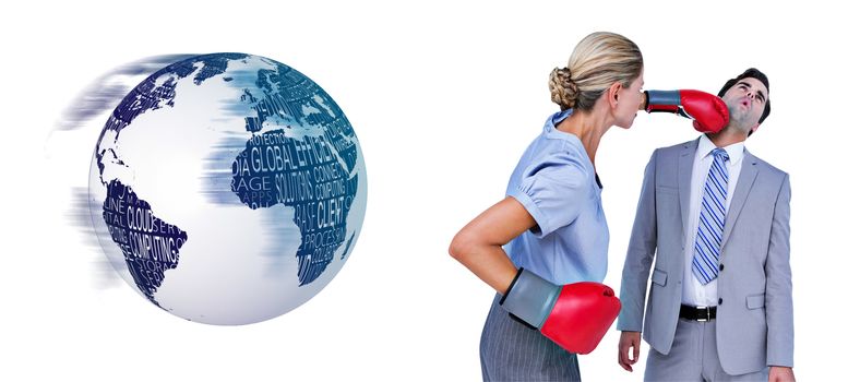 Businesswoman punching colleague with boxing gloves against black and white earth