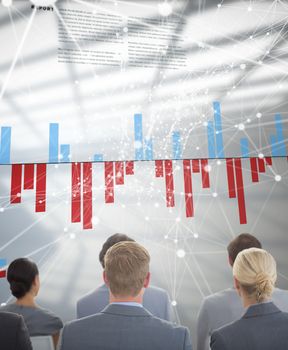 Business team during conference against business interface with graphs and data