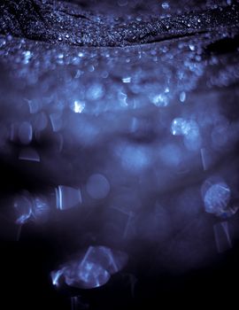 Beautiful bokeh  background - Water drops on the green banana leaf.