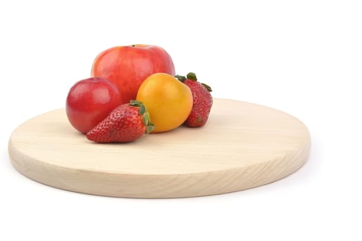 apple, plum and strawberry on white background