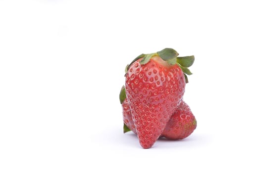 fresh raw strawberries  over white background