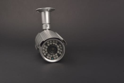 security camera on dark background