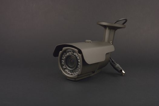 security camera on dark background