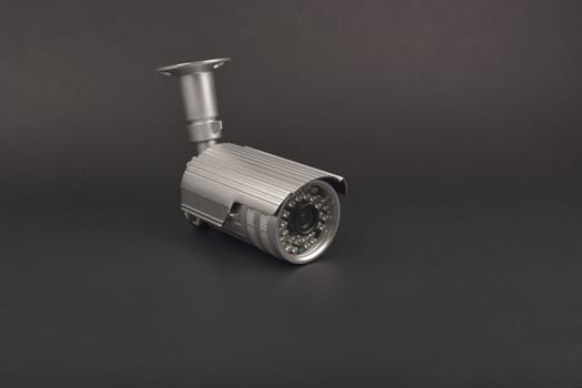 security camera on dark background