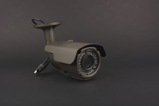 security camera on dark background