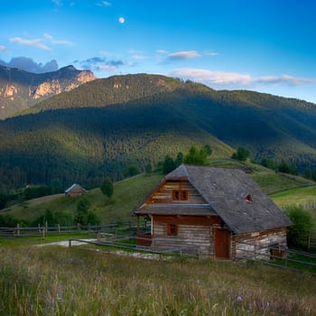 Evening, sunset on mountain hills of Simon village. Bran.