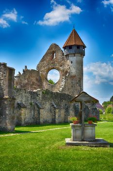 Cârţa Monastery is a former Cistercian (Benedictine) monastery in the Ţara Făgăraşului region in southern Transylvania. The monastery was probably founded in 1202-1206 by monks from Igriș abbey (daughter house of Pontigny abbey)