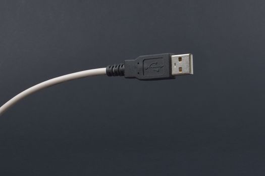 USB Cable Plug  on dark background