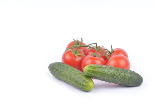 cucumber and tomato isolated on white