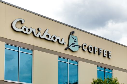 MINNEAPOLIS, MN/USA - AUGUST 8, 2015: Caribou Coffee corporate headquarters and logo. Caribou Coffee Company is a specialty coffee and espresso retailer.