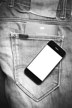 passport in jean pocket with smart phone black and white tone color style