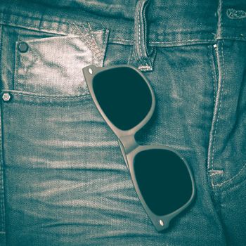 sunglasses on jean pants retro vintage style