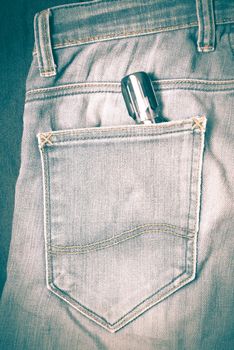 screwdriver in jean pocket pants retro vintage style