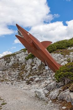 Obertraun, Austria - June 27, 2014: Dachstein Shark, attraction on the Heilbronn circular trail. It provides visitors with a glimpse into the pre-historic past of the Dachstein Massif.