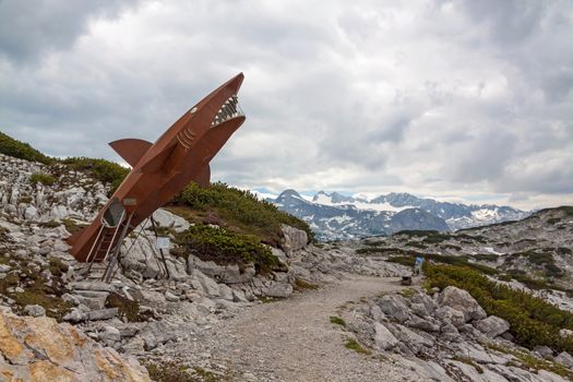 Obertraun, Austria - June 27, 2014: Dachstein Shark, attraction on the Heilbronn circular trail. It provides visitors with a glimpse into the pre-historic past of the Dachstein Massif.
