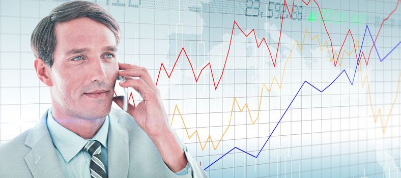 Business man having phone call  against stocks and shares