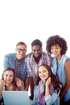 Fashion students working as a team  against white background with vignette