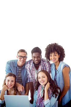 Fashion students working as a team  against white background with vignette