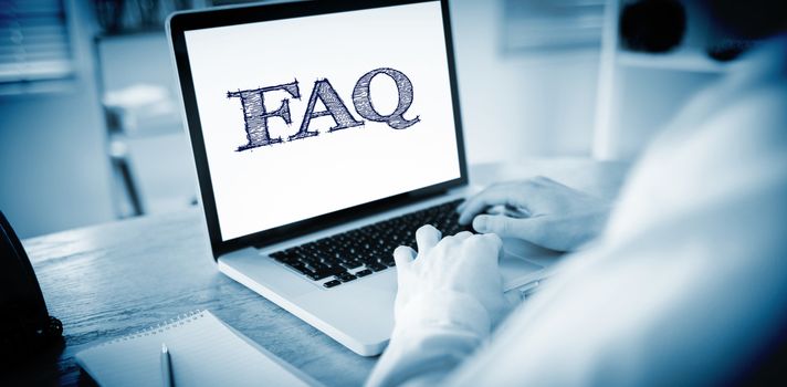 The word faq against businessman working on his laptop