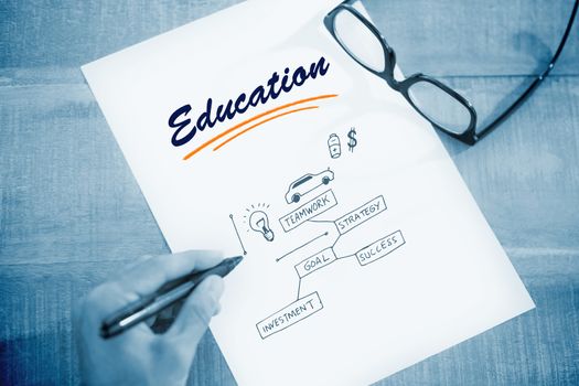 The word education and left hand writing on white page on working desk against business concept vector